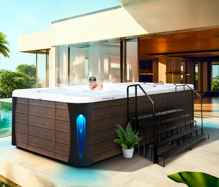 Calspas hot tub being used in a family setting - Woodstock